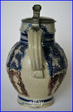 A very nice and interesting Antique Westerwald Stoneware jug stein dancing