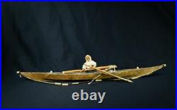 Antique Eskimo Kayak with figure and implements very nice. Early 20th century