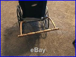Antique baby carriage. Very nice