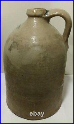 Antique stoneware jug with handle very nice condition