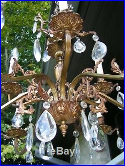 Very nice and fabulous vintage 9 lt aged brass chandelier with shining drops
