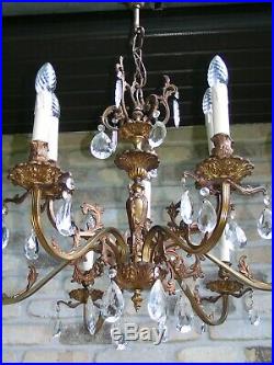 Very nice and fabulous vintage 9 lt aged brass chandelier with shining drops