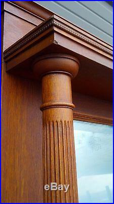 Very nice oak mantle beveled mirror columns and carvings