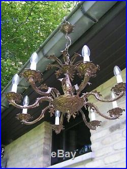 Very nice ornated vintage 8 lt aged brass chandelier. Look @ this 1
