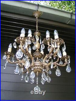 Very nice ornated vintage French 12 lt chandelier with shining drops. Look! 